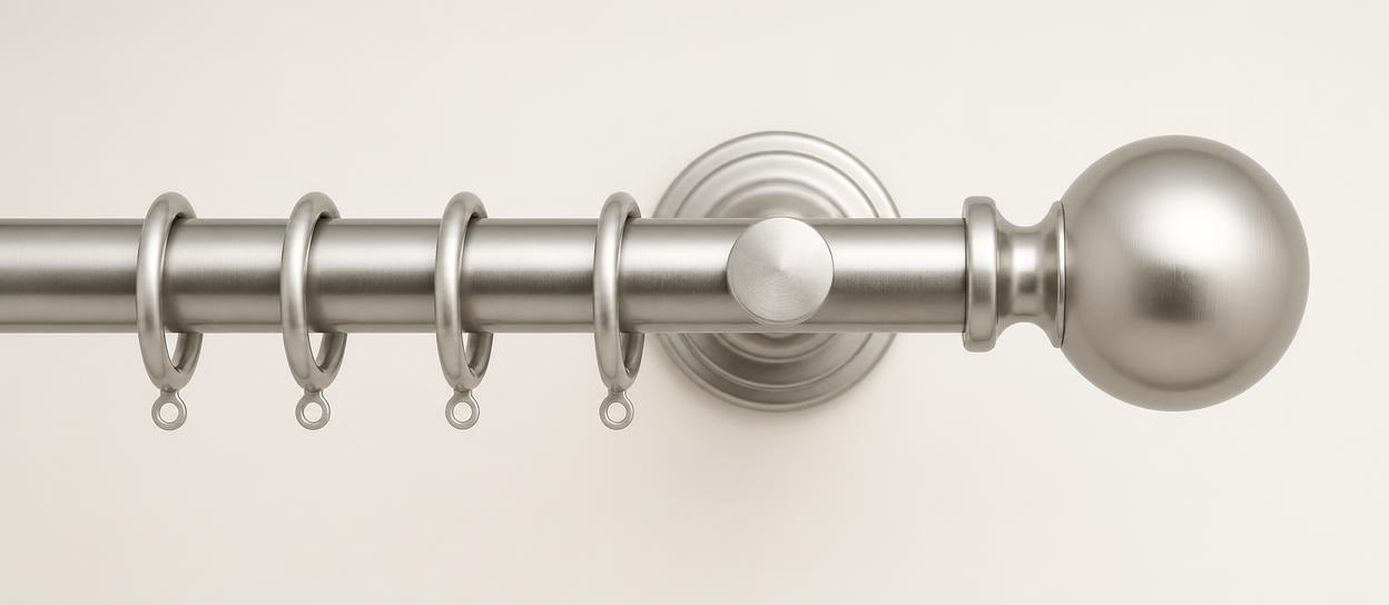 Brushed nickel drapery rod with sphere finial
