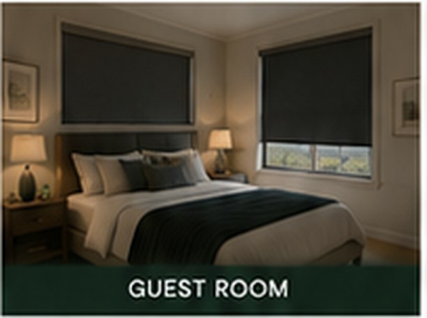 Room darkening shades in a guest room